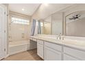 Main bathroom with double vanity and bathtub at 9750 N Monterey Dr # 7, Fountain Hills, AZ 85268