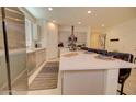 Modern kitchen with white quartz island and gray cabinets at 1130 E Meadowbrook Dr, Casa Grande, AZ 85122