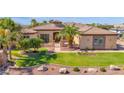 Stunning property with a large yard and mature landscaping at 17903 W Solano Dr, Litchfield Park, AZ 85340