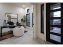 Bright home office with a desk and comfortable seating at 8332 E Sand Flower Dr # 20, Scottsdale, AZ 85266