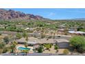 Stunning aerial view showcasing the home's location and mountain backdrop at 4452 E Lincoln Dr, Paradise Valley, AZ 85253