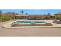 Inviting pool with spacious patio, ideal for relaxation and entertainment at 4452 E Lincoln Dr, Paradise Valley, AZ 85253