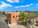 Aerial view of building and surrounding parking lot at 16844 E Ave Of The Fountains -- # 201, Fountain Hills, AZ 85268