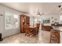 Charming dining area with a large table and plenty of natural light at 9406 W Palmer Dr, Peoria, AZ 85345