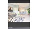 Open living area with a view of kitchen and dining area at 7101 W Beardsley Rd # 452, Glendale, AZ 85308