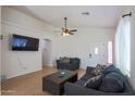 Living room with tile floors and two sofas at 14972 S Redondo Rd, Arizona City, AZ 85123