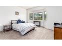 Bright bedroom with neutral decor and ample natural light at 1560 E Melrose Dr, Casa Grande, AZ 85122