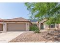 House exterior with a two-car garage and landscaping at 4536 E Via Dona Rd, Cave Creek, AZ 85331