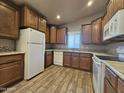 Well-equipped kitchen with ample cabinetry and modern appliances at 650 N Hawes Rd # 3404, Mesa, AZ 85207