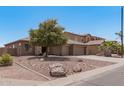 Two-story home with a landscaped yard and a two-car garage at 3407 E Glacier Pl, Chandler, AZ 85249