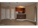 Living Room, Kitchen, and entryway with tile flooring at 1701 E Colter St # 291, Phoenix, AZ 85016