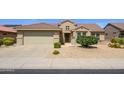 Single story home with attached garage and desert landscaping at 18000 N Estrella Vista Dr, Surprise, AZ 85374