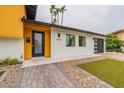 House entrance with walkway and landscaping at 8608 E Angus Dr, Scottsdale, AZ 85251