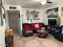 Living room featuring comfortable seating and Gathering photos at 303 N 7Th St, Avondale, AZ 85323