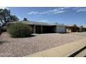 Charming single story home with a two car garage at 4151 E Clovis Ave, Mesa, AZ 85206