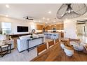 Open living space with kitchen, dining, and living areas at 22511 E Saddle Ct, Queen Creek, AZ 85142