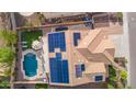 Aerial view of house showing pool, solar panels and backyard at 5116 W Trotter Trl, Phoenix, AZ 85083