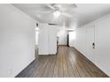 Open concept living room showcasing wood-look floors and neutral tones at 2236 E Nancy Ln, Phoenix, AZ 85042