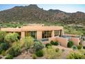 Luxury home with expansive windows and mountain views at 36631 N Peaceful Pl, Carefree, AZ 85377