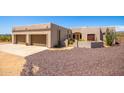 Two-story home with a two-car garage and desert landscaping at 40016 N 1St Pl, Phoenix, AZ 85086