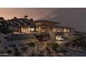 Contemporary home with attached garage and hillside setting at 6041 E Foothill N Dr, Paradise Valley, AZ 85253