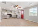Modern kitchen with stainless steel appliances and gray cabinets at 9424 N 2Nd Pl, Phoenix, AZ 85020
