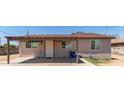 House exterior featuring a covered patio and a well-maintained front yard at 622 S 4Th St, Avondale, AZ 85323