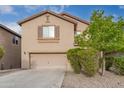 Two-story house with attached garage and landscaping at 33025 N Mildred Ln, San Tan Valley, AZ 85144