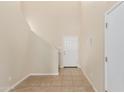 Entryway with staircase, tile flooring, and coat closet at 33025 N Mildred Ln, San Tan Valley, AZ 85144