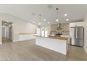 Updated kitchen with wood countertops and breakfast bar at 6802 E Beverly Ln, Scottsdale, AZ 85254