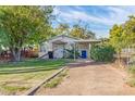 Charming bungalow style home with carport and mature trees at 1112 N Center St, Mesa, AZ 85201