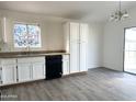 Bright dining area with sliding door leading to backyard at 12600 W Madero Dr, Arizona City, AZ 85123