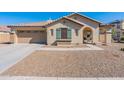 One-story home with green shutters and gravel landscaping at 40350 W Art Pl, Maricopa, AZ 85138