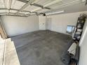 Attached garage with automatic opener and ample storage space at 2616 E Southgate Ave # 2, Phoenix, AZ 85040