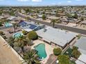 Aerial view of home with pool and surrounding area at 17210 N Foothills Dr, Sun City, AZ 85373