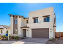 Contemporary two-story home with clean lines and a neutral color scheme at 17975 W Vogel Ave, Goodyear, AZ 85338