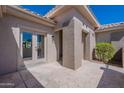 Covered patio with double doors and flagstone flooring at 22408 N Las Vegas Dr, Sun City West, AZ 85375