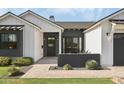Modern farmhouse exterior with walkway and landscaping at 6836 N 13Th Pl # B, Phoenix, AZ 85014