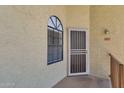 Condo entrance with security door and window at 930 N Mesa Dr # 2037, Mesa, AZ 85201