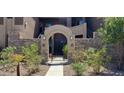 Inviting entryway with gated access to the community at 7027 N Scottsdale Rd # 237, Scottsdale, AZ 85253