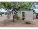 Brick house with green trim and desert landscaping at 1818 W Thomas Rd, Phoenix, AZ 85015