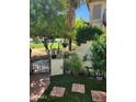 Landscaped yard with walkway and gate at 8805 S 51St St # 2, Phoenix, AZ 85044