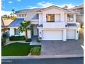 Modern two-story home with a three-car garage at 6530 N 29Th St, Phoenix, AZ 85016