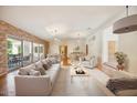Spacious living area featuring hardwood floors and ample natural light at 5302 E Mercer Ln, Scottsdale, AZ 85254