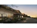 Landscaped driveway leading to modern home with mountain backdrop at 5850 E Glen Dr, Paradise Valley, AZ 85253