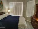 Spacious bedroom with ample natural light and a dresser at 14950 W Mountain View Blvd # 1111, Surprise, AZ 85374