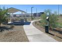 Park with covered picnic area and dog waste station at 24232 W Bowker St, Buckeye, AZ 85326