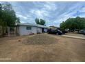 Ranch style home with carport and spacious yard at 5919 W Marlette Ave, Glendale, AZ 85301