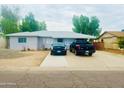 Ranch style home with carport and spacious yard at 5919 W Marlette Ave, Glendale, AZ 85301