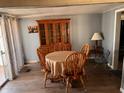 Bright dining room with wood table and chairs at 2701 E Allred Ave # 68, Mesa, AZ 85204